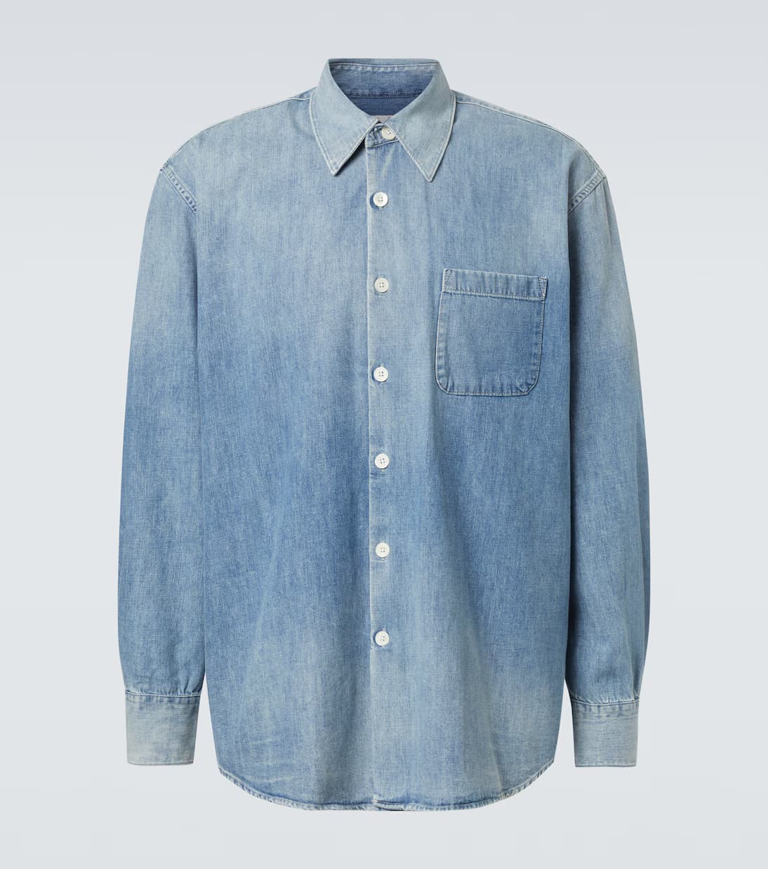 Above denim shirt